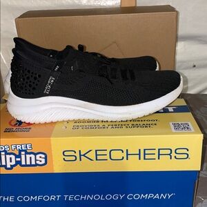 Skechers Black and White Slip-On Shoes